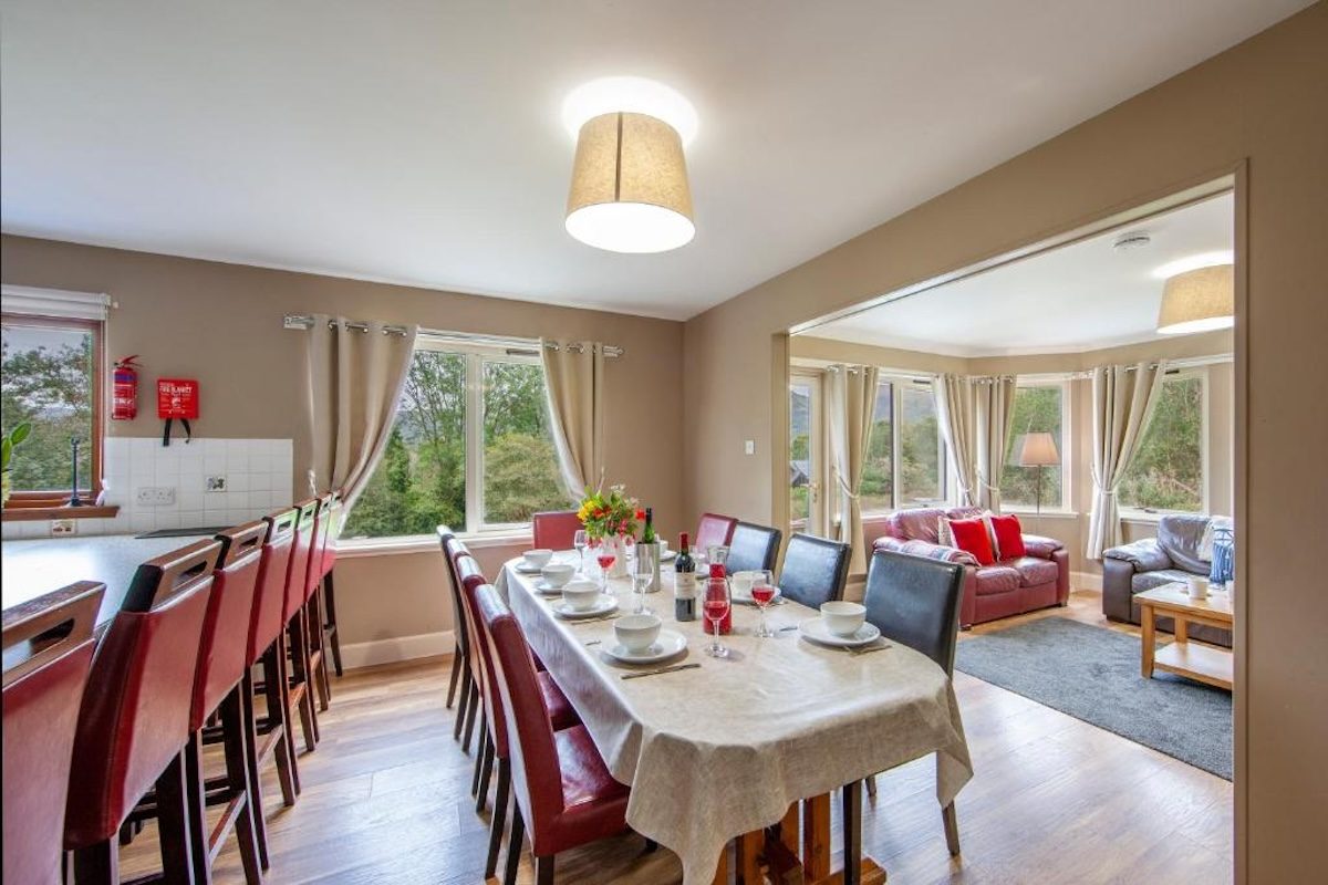 The hand-made dining table set for eight